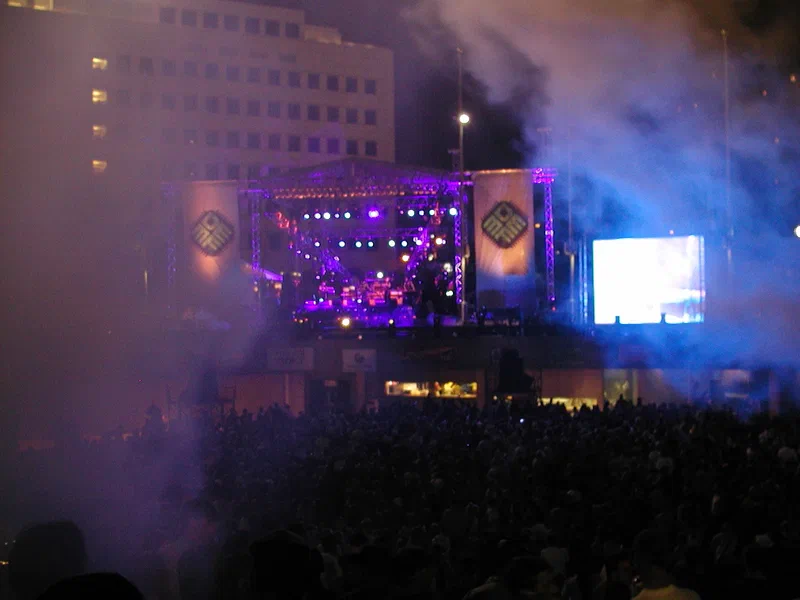 Crowd and stage at the Detroit Electronic Music Festival after dark